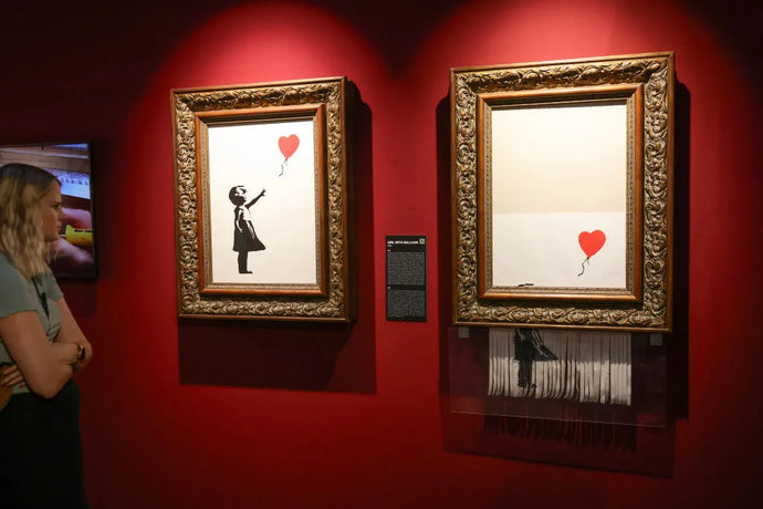 Banksy girl with balloon stolen