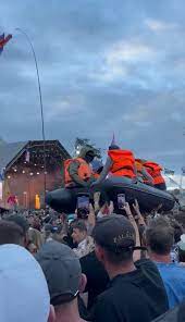 Banksy launches inflatable migrant boat artwork during Idles’ Glastonbury set